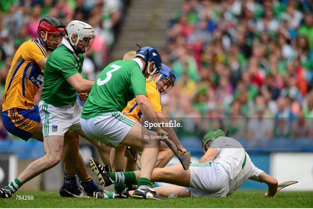 18 August 2013; The sliothar goes through the legs of Limerick goalkeeper Nickie Quaid before ending up in the back of the net for Clare's only goal, as Clare's Pádraic Collins and Limerick's Richie McCarthy close in. GAA Hurling All-Ireland Senior Championship, Semi-Final, Limerick v Clare, Croke Park, Dublin. Photo by Sportsfile
