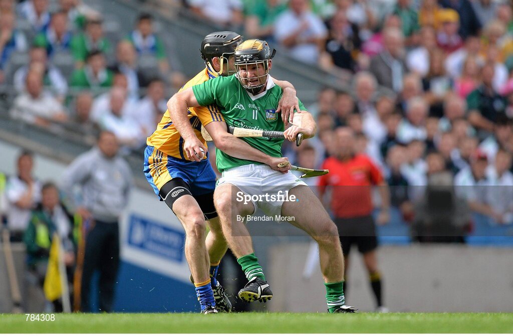 18 August 2013; James Ryan, Limerick, is tackled by Patrick Donnellan, Clare. GAA Hurling All-Ireland Senior Championship, Semi-Final, Limerick v Clare, Croke Park, Dublin. Picture credit: Brendan Moran / SPORTSFILE