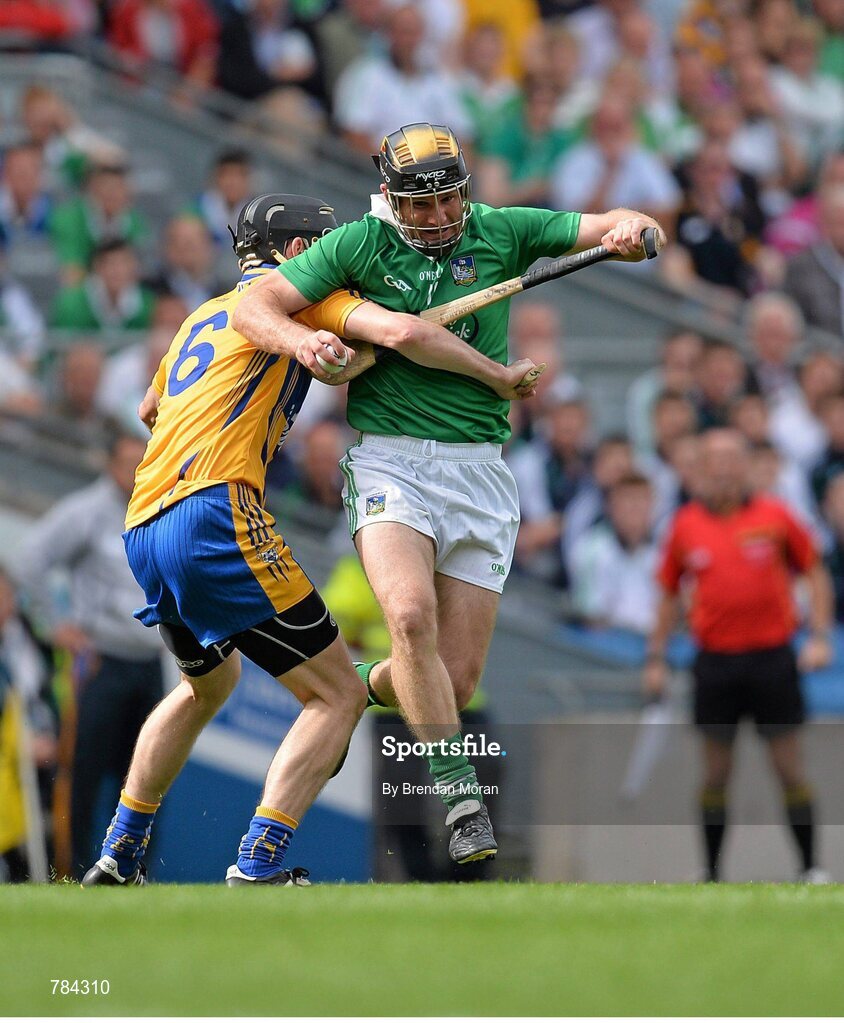 18 August 2013; James Ryan, Limerick, is tackled by Patrick Donnellan, Clare. GAA Hurling All-Ireland Senior Championship, Semi-Final, Limerick v Clare, Croke Park, Dublin. Picture credit: Brendan Moran / SPORTSFILE