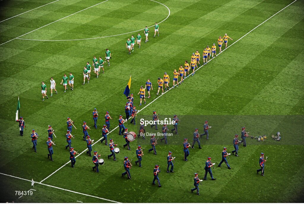 18 August 2013; The Clare and Limerick teams parade behind the Artane School of Music Band. GAA Hurling All-Ireland Senior Championship, Semi-Final, Limerick v Clare, Croke Park, Dublin. Picture credit: Dáire Brennan / SPORTSFILE