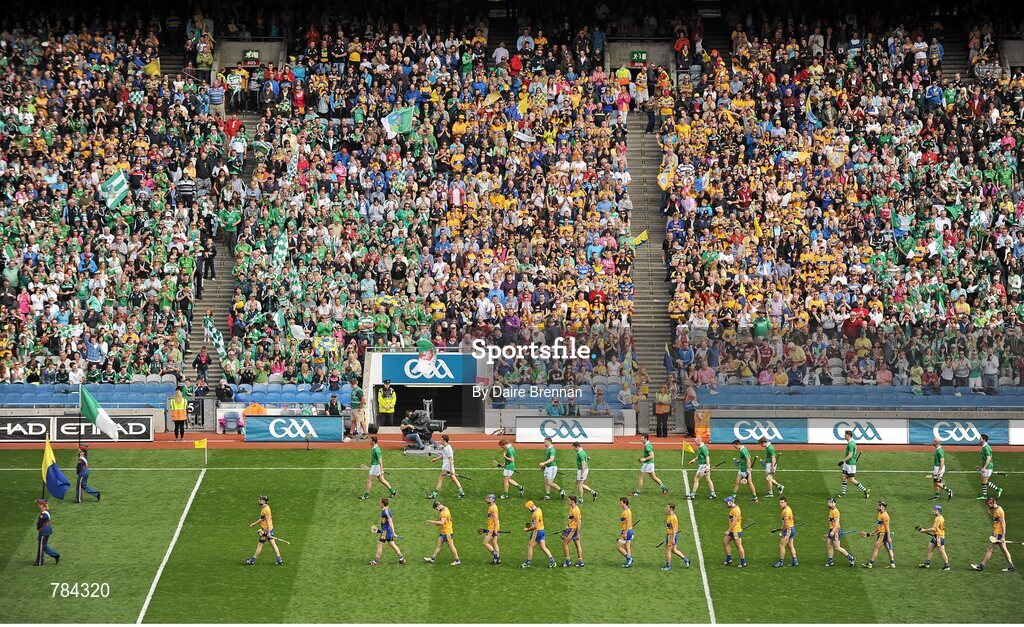 18 August 2013; The Clare and Limerick teams parade behind the Artane School of Music Band. GAA Hurling All-Ireland Senior Championship, Semi-Final, Limerick v Clare, Croke Park, Dublin. Picture credit: Dáire Brennan / SPORTSFILE