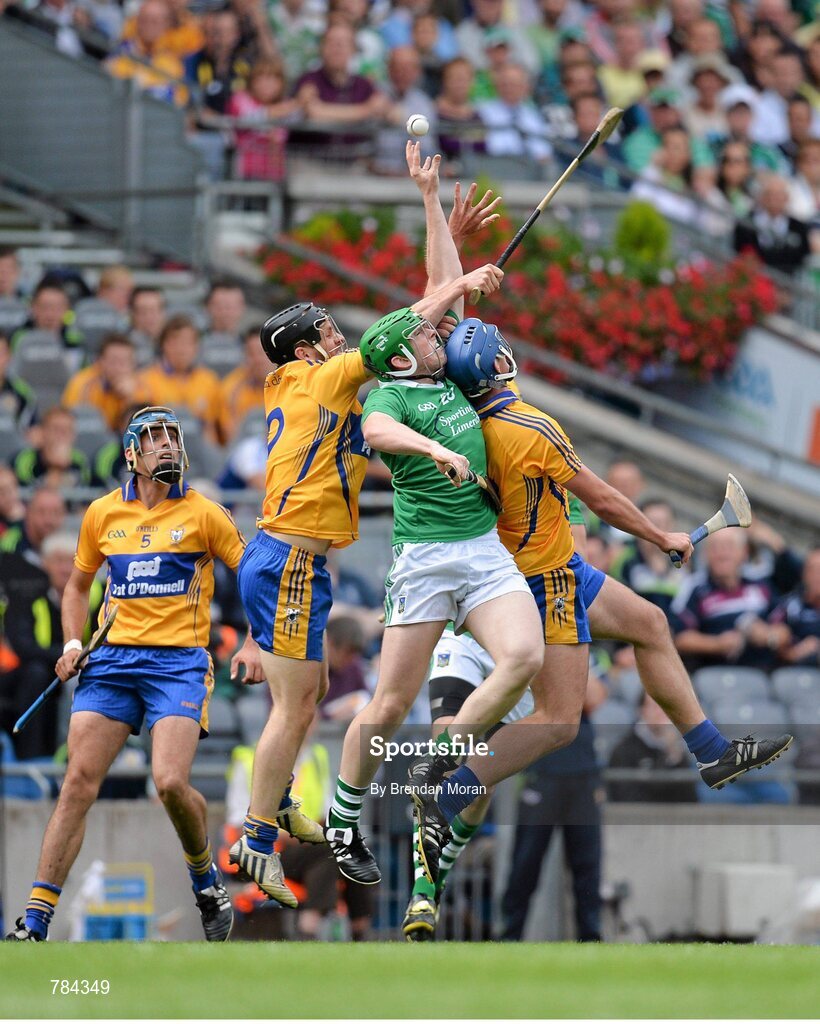18 August 2013; Shane Dowling, Limerick, contests a dropping ball with Domnnall O'Donovan and Conor Ryan, right, Clare. GAA Hurling All-Ireland Senior Championship, Semi-Final, Limerick v Clare, Croke Park, Dublin. Picture credit: Brendan Moran / SPORTSFILE