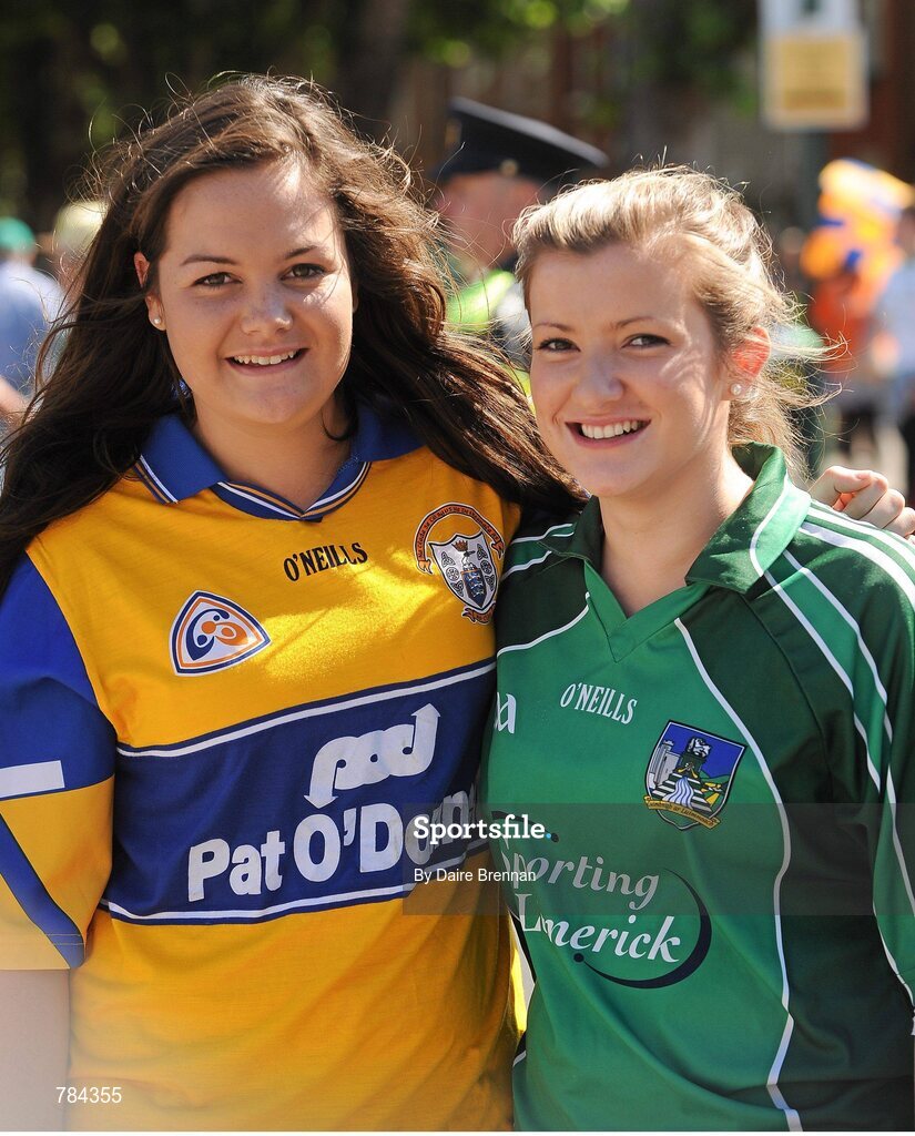 18 August 2013; Friends Michelle Vaughan, from Cahirdavin, Co. Limerick, and Ruth Gilligan, from Ardnacrusha, Co. Clare, on their way to the game. GAA Hurling All-Ireland Senior Championship, Semi-Final, Limerick v Clare, Croke Park, Dublin. Picture credit: Dáire Brennan / SPORTSFILE