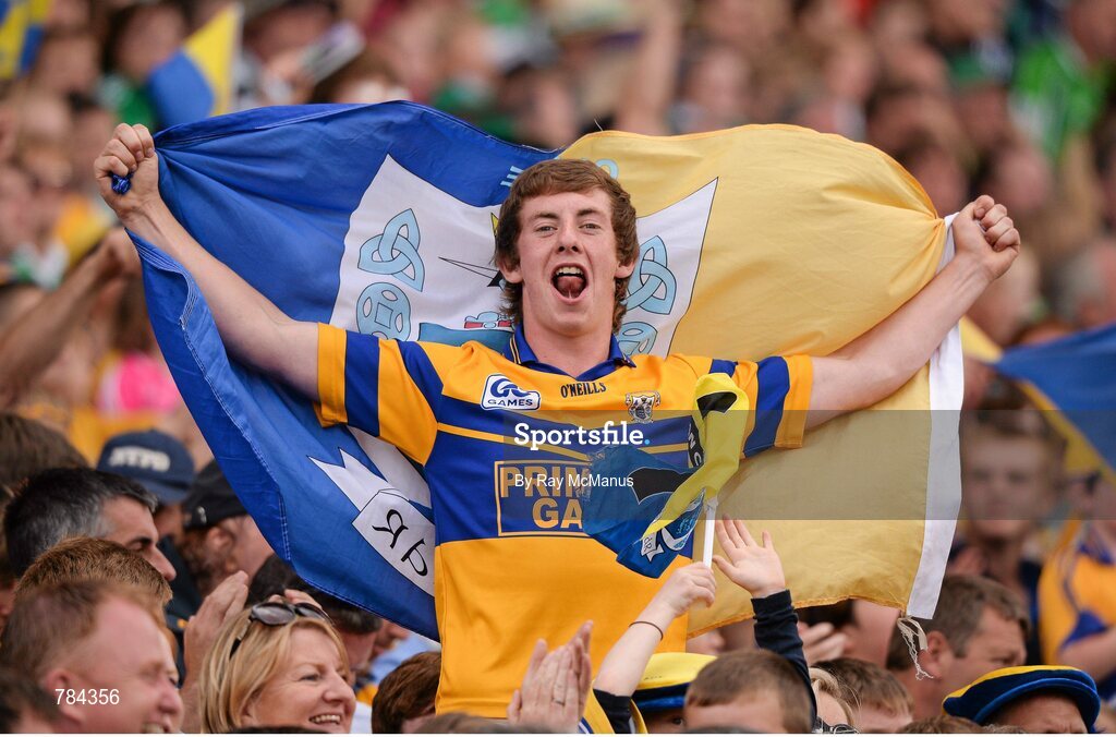 18 August 2013; A Clare supporter, in the Cusack Stand, celebrates a score. GAA Hurling All-Ireland Senior Championship, Semi-Final, Limerick v Clare, Croke Park, Dublin. Picture credit: Ray McManus / SPORTSFILE