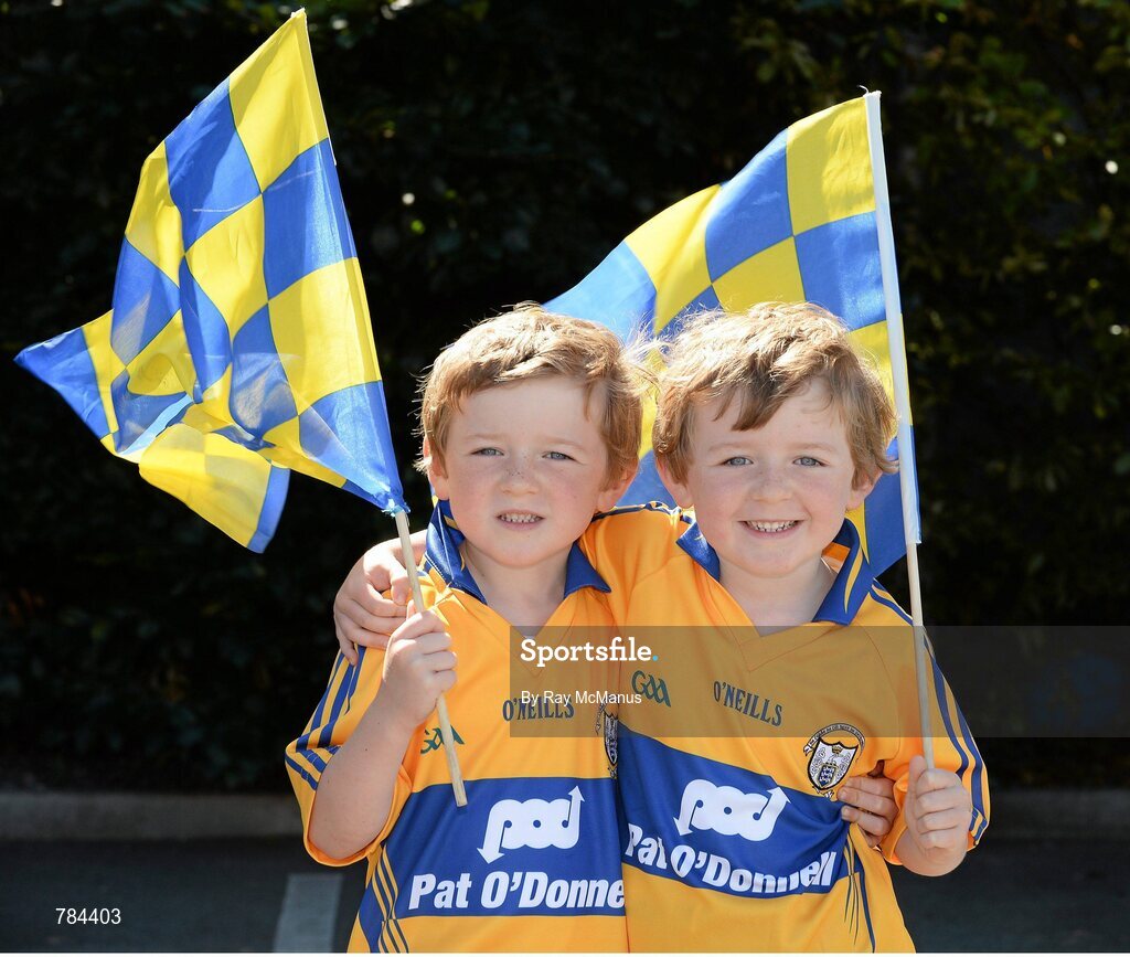 18 August 2013; Twins Sean, left, and Darragh McNamara, 5 years, from Quin, Co. Clare, on their way to the game. GAA Hurling All-Ireland Senior Championship, Semi-Final, Limerick v Clare, Croke Park, Dublin. Picture credit: Ray McManus / SPORTSFILE