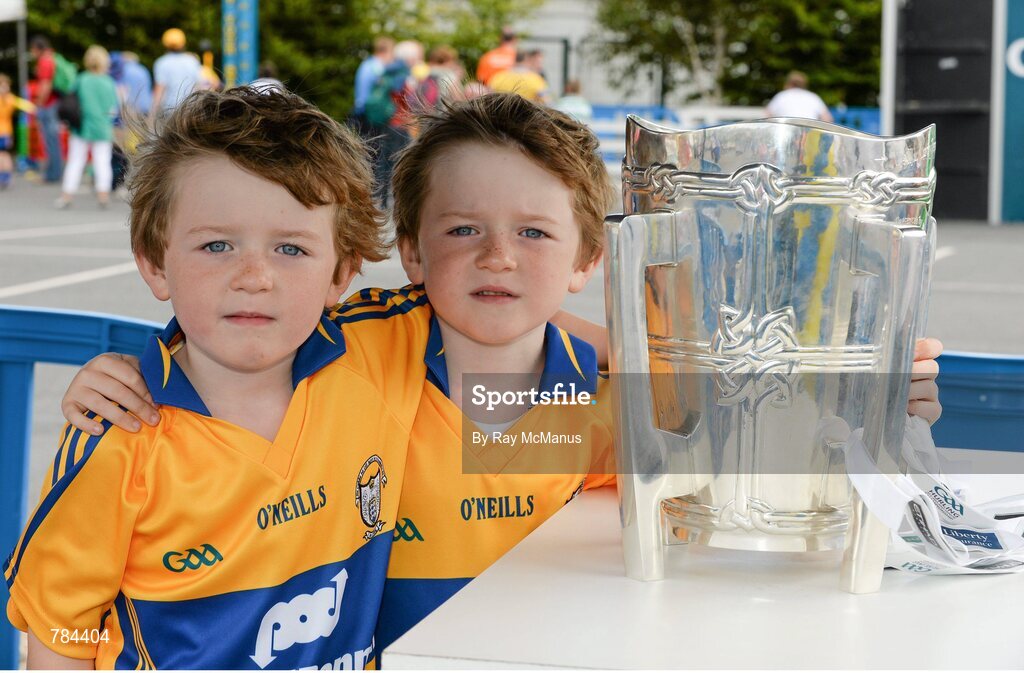 18 August 2013; Twins Sean, left, and Darragh McNamara, 5 years, from Quin, Co. Clare, with the Liam Mac Carthy Cup on their way to the game. GAA Hurling All-Ireland Senior Championship, Semi-Final, Limerick v Clare, Croke Park, Dublin. Picture credit: Ray McManus / SPORTSFILE