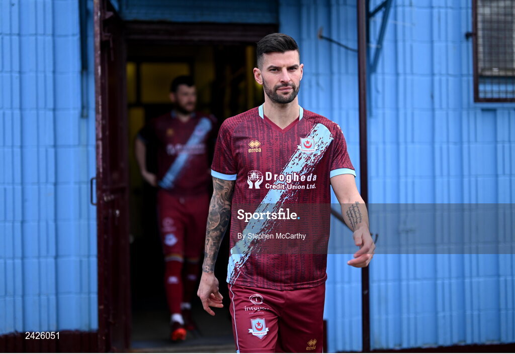 6 February 2023; Adam Foley makes his way to prepare for a squad photograph during a Drogheda United squad portrait session at Weaver's Park in Drogheda, Louth. Photo by Stephen McCarthy/Sportsfile