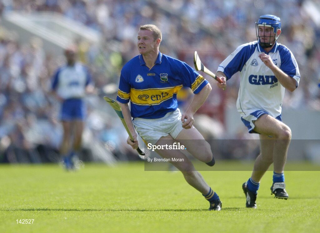 6 June 2004; Conor Gleeson, Tipperary, in action against Michael Walsh, Waterford. Guinness Munster Senior Hurling Championship semi-final, Tipperary v Waterford, Pairc Ui Chaoimh, Cork. Picture credit; Brendan Moran / SPORTSFILE