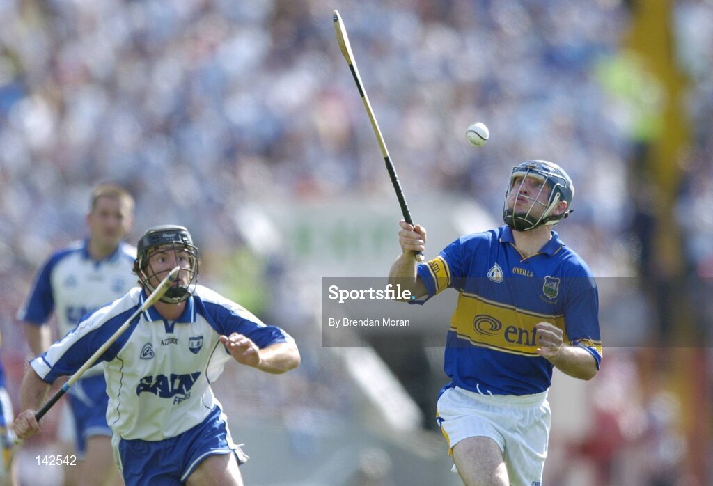 6 June 2004; Eoin Kelly, Tipperary, in action against James Murray, Waterford. Guinness Munster Senior Hurling Championship semi-final, Tipperary v Waterford, Pairc Ui Chaoimh, Cork. Picture credit; Brendan Moran / SPORTSFILE