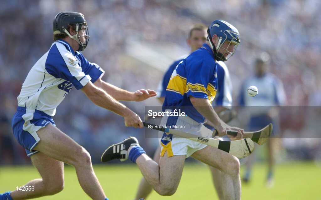 6 June 2004; Eoin Kelly, Tipperary, in action against James Murray, Waterford. Guinness Munster Senior Hurling Championship semi-final, Tipperary v Waterford, Pairc Ui Chaoimh, Cork. Picture credit; Brendan Moran / SPORTSFILE