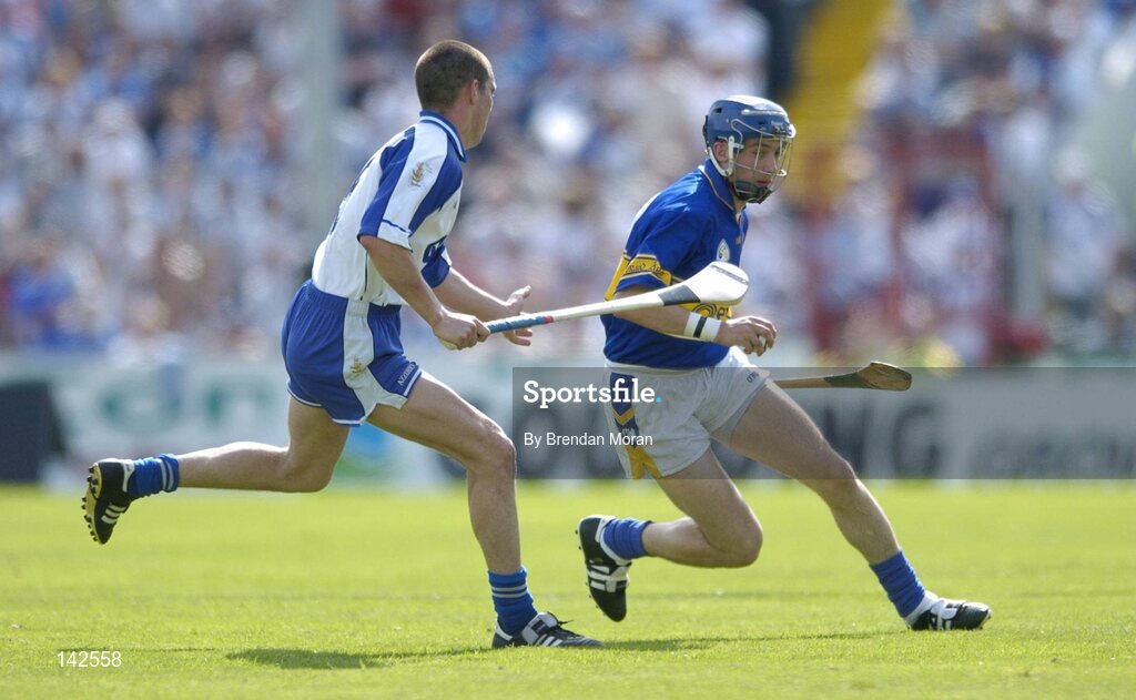 6 June 2004; Benny Dunne, Tipperary, in action against Brian Phelan, Waterford. Guinness Munster Senior Hurling Championship semi-final, Tipperary v Waterford, Pairc Ui Chaoimh, Cork. Picture credit; Brendan Moran / SPORTSFILE