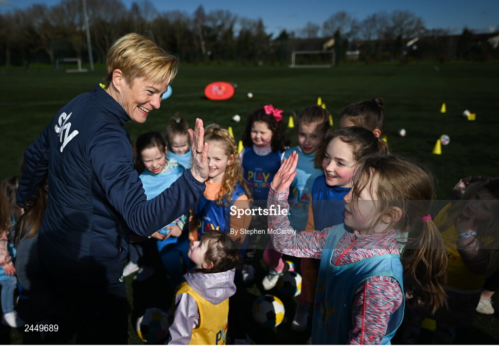 7 March 2023; Republic of Ireland Women's manager Vera Pauw gives a high five to Alice Dennehy of Hartstown Huntstown FC at the launch of UEFA Disney Playmakers 2023 at Hartstown Huntstown Football Club in Dublin. Photo by Stephen McCarthy/Sportsfile