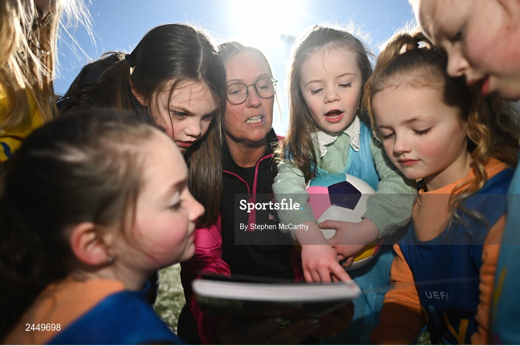 7 March 2023; Coach Maria Lawless with Hartstown Huntstown FC players, from left, Abigail Mooney, Ila McCabe, Freya McQuillan, Madison Mooney and Erin Saoirse Nolan at the launch of UEFA Disney Playmakers 2023 at Hartstown Huntstown Football Club in Dublin. Photo by Stephen McCarthy/Sportsfile