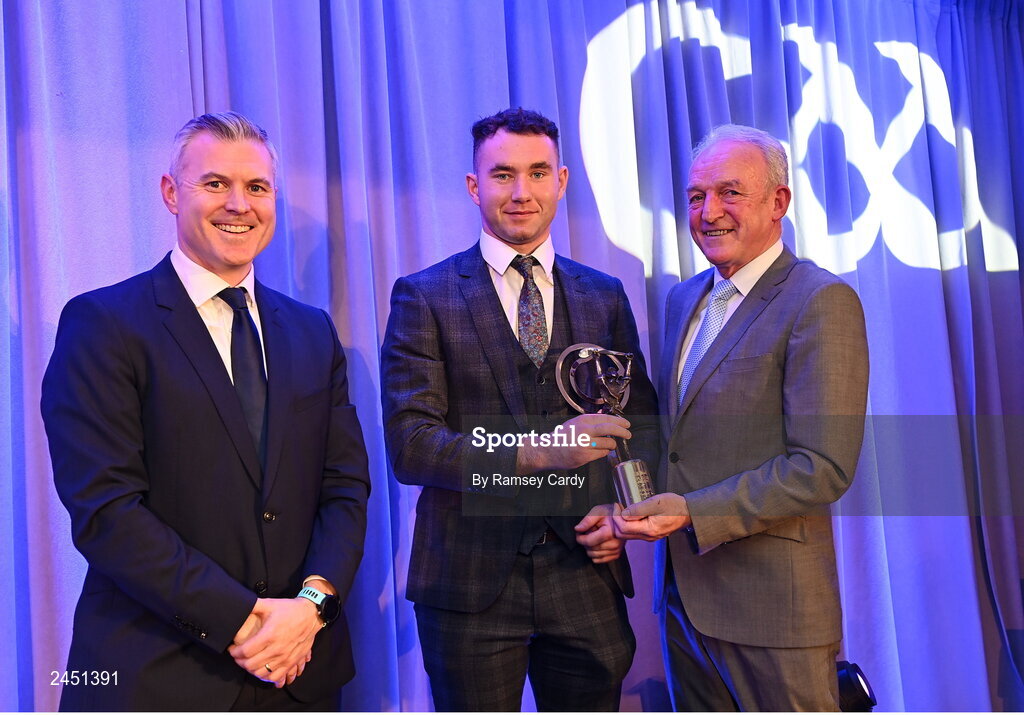 10 March 2023; Ryan McGarry of Dunloy Cúchullain's is presented with his AIB GAA Hurling Club Team of The Year award by GAA Vice President John Murphy and AIB CMO Mark Doyle, at the AIB Club Players Awards at Croke Park in Dublin. Photo by Ramsey Cardy/Sportsfile