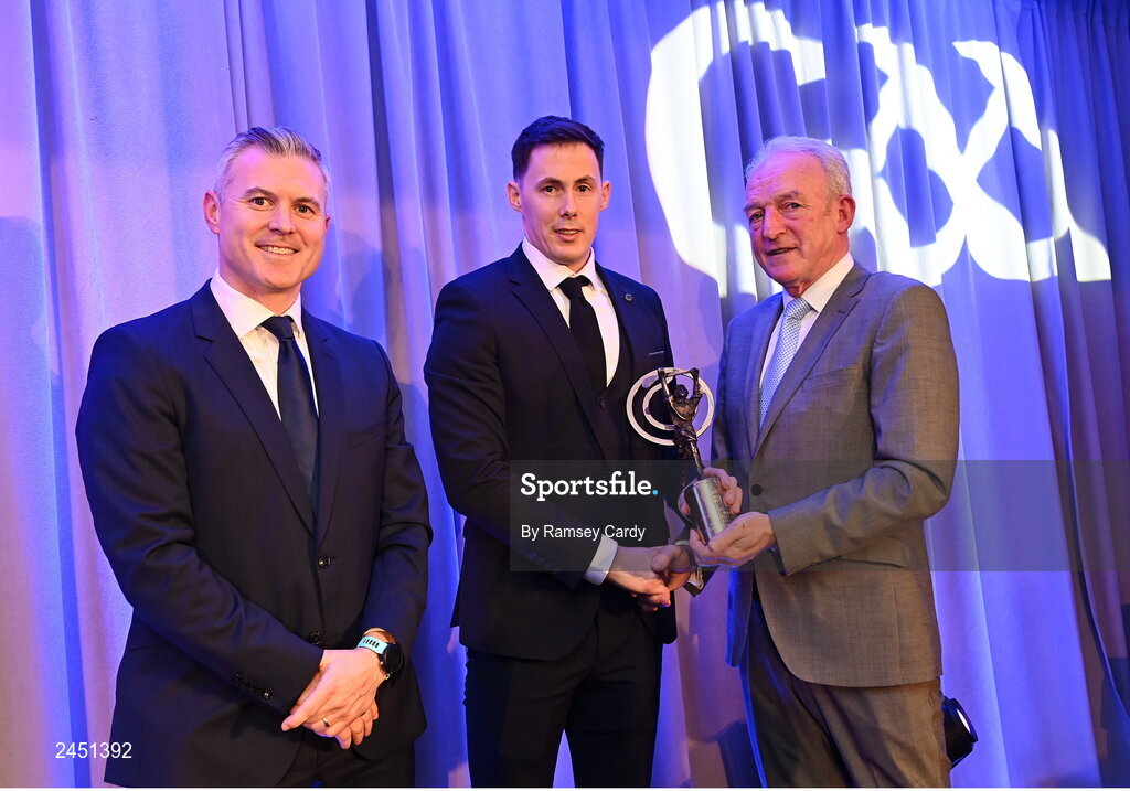 10 March 2023; Richie Reid of Shamrocks Ballyhale is presented with his AIB GAA Hurling Club Team of The Year award by GAA Vice President John Murphy, right, and AIB CMO Mark Doyle, at the AIB Club Players Awards at Croke Park in Dublin. Photo by Ramsey Cardy/Sportsfile
