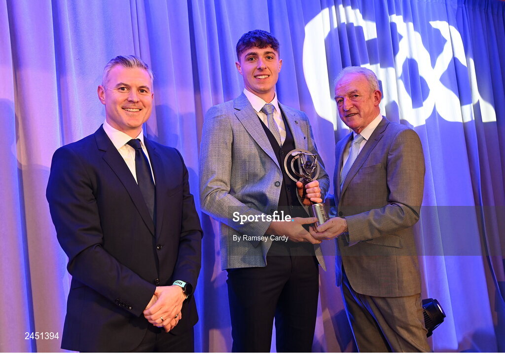 10 March 2023; Darragh Corcoran of Shamrocks Ballyhale is presented with his AIB GAA Hurling Club Team of The Year award by GAA Vice President John Murphy, right, and AIB CMO Mark Doyle, at the AIB Club Players Awards at Croke Park in Dublin. Photo by Ramsey Cardy/Sportsfile