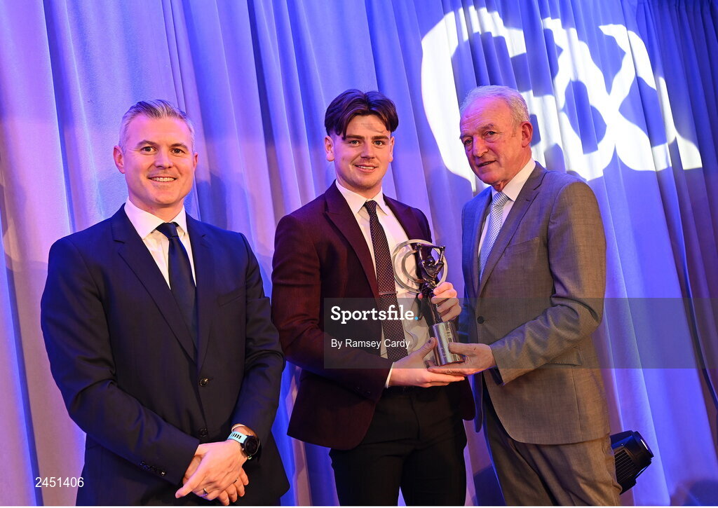10 March 2023; Conal Cunning of Dunloy Cúchullain's is presented with his AIB GAA Hurling Club Team of The Year award by GAA Vice President John Murphy, right, and AIB CMO Mark Doyle, at the AIB Club Players Awards at Croke Park in Dublin. Photo by Ramsey Cardy/Sportsfile