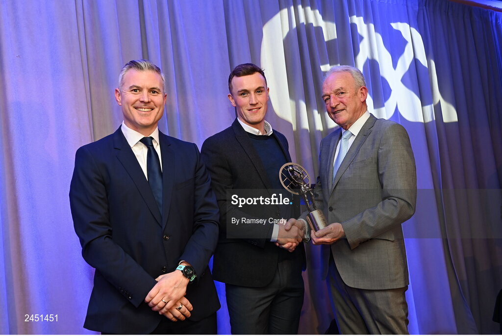 10 March 2023; Shane Cunningham of Kilmacud Crokes is presented with his AIB GAA Football Club Team of The Year award by GAA Vice President John Murphy, right, and AIB CMO Mark Doyle, at the AIB Club Players Awards at Croke Park in Dublin. Photo by Ramsey Cardy/Sportsfile