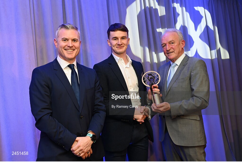 10 March 2023; Dara Mullin of Kilmacud Crokes is presented with his AIB GAA Football Club Team of The Year award by GAA Vice President John Murphy, right, and AIB CMO Mark Doyle, at the AIB Club Players Awards at Croke Park in Dublin. Photo by Ramsey Cardy/Sportsfile