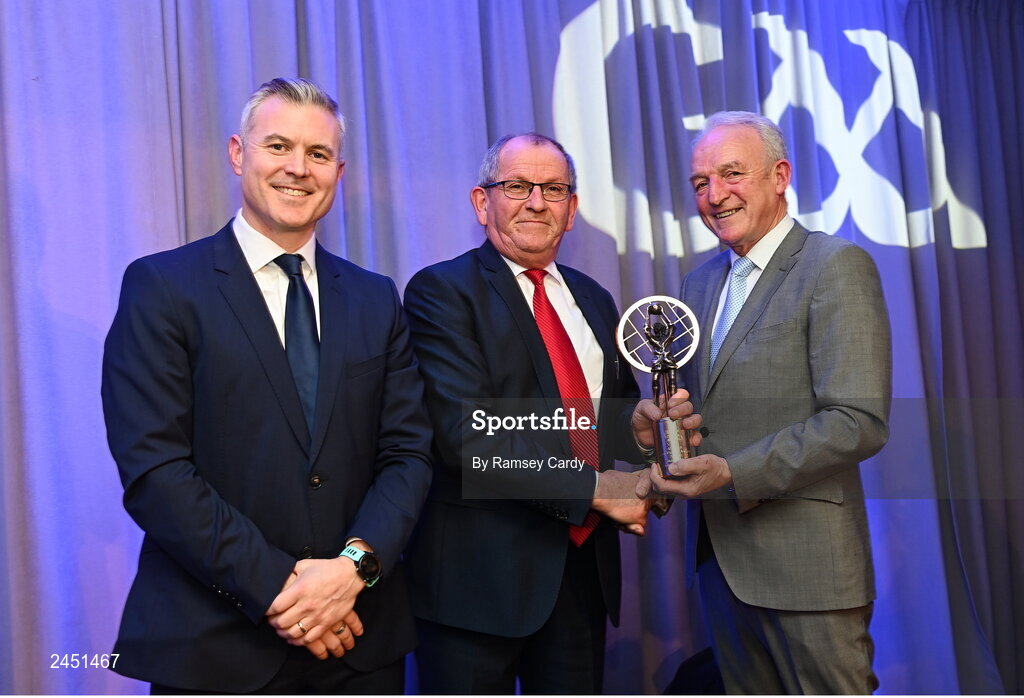 10 March 2023; Gerry Walsh, father of Shane Walsh of Kilmacud Crokes collects the AIB GAA Football Club Team of The Year award on his behalf from GAA Vice President John Murphy, right, and AIB CMO Mark Doyle, at the AIB Club Players Awards at Croke Park in Dublin. Photo by Ramsey Cardy/Sportsfile