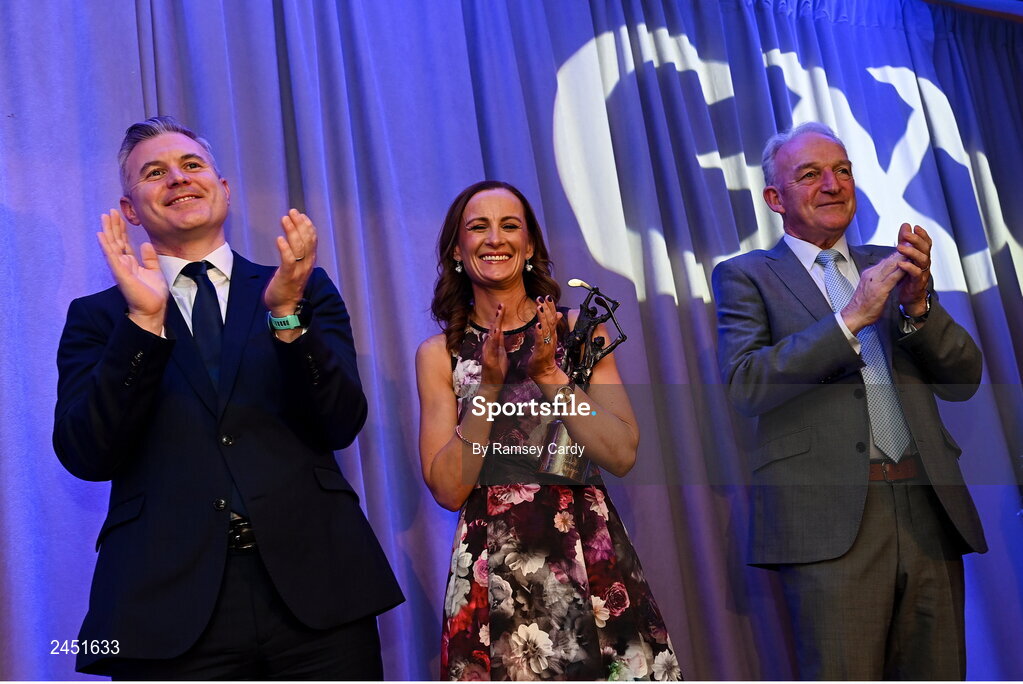 10 March 2023; Katrina Holden, sister of Joey Holden of Shamrocks Ballyhale, GAA Vice President John Murphy, right, and AIB CMO Mark Doyle, watch a video message from Hurler of the Year Joey Holden at the AIB Club Players Awards at Croke Park in Dublin. Photo by Ramsey Cardy/Sportsfile