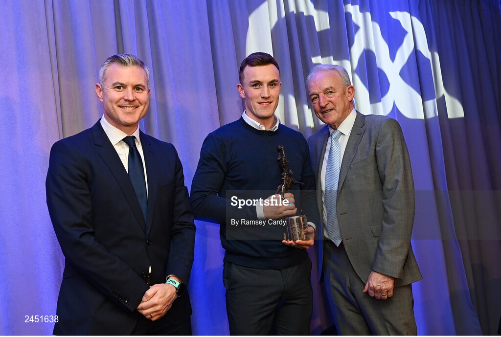 10 March 2023; Shane Cunningham of Kilmacud Crokes is presented with his AIB GAA Football Club Player of The Year award by GAA Vice President John Murphy, right, and AIB CMO Mark Doyle, at the AIB Club Players Awards at Croke Park in Dublin. Photo by Ramsey Cardy/Sportsfile