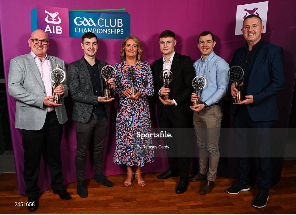 10 March 2023; Watty Graham’s Glen players, from left, John Bradley, father of Emmett Bradley, Danny Tallon, Karen Dougan, mother of Ryan Dougan, Ethan Doherty, Michael Warnock and Eddie Doherty, father of Jack Doherty, with their AIB GAA Football Club Team of The Year award at the AIB Club Players Awards at Croke Park in Dublin. Photo by Ramsey Cardy/Sportsfile