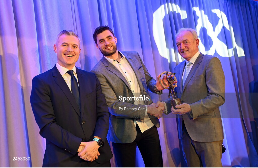 10 March 2023; Stephen O’Keeffe of Ballygunner is presented with his 2022 AIB GAA Hurling Club Team of The Year award by AIB CMO Mark Doyle, left, and GAA Vice President John Murphy at the AIB Club Players Awards at Croke Park in Dublin. Photo by Ramsey Cardy/Sportsfile