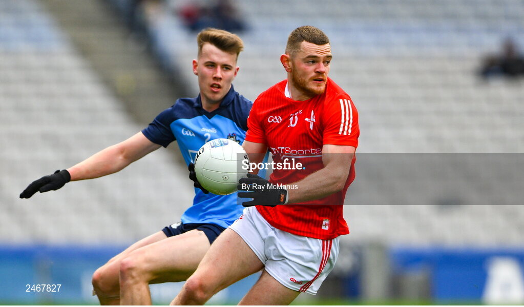 26 March 2023; Niall Sharkey of Louth in action against Dáire Newcombe of Dublin during the Allianz Football League Division 2 match between Dublin and Louth at Croke Park in Dublin. Photo by Ray McManus/Sportsfile