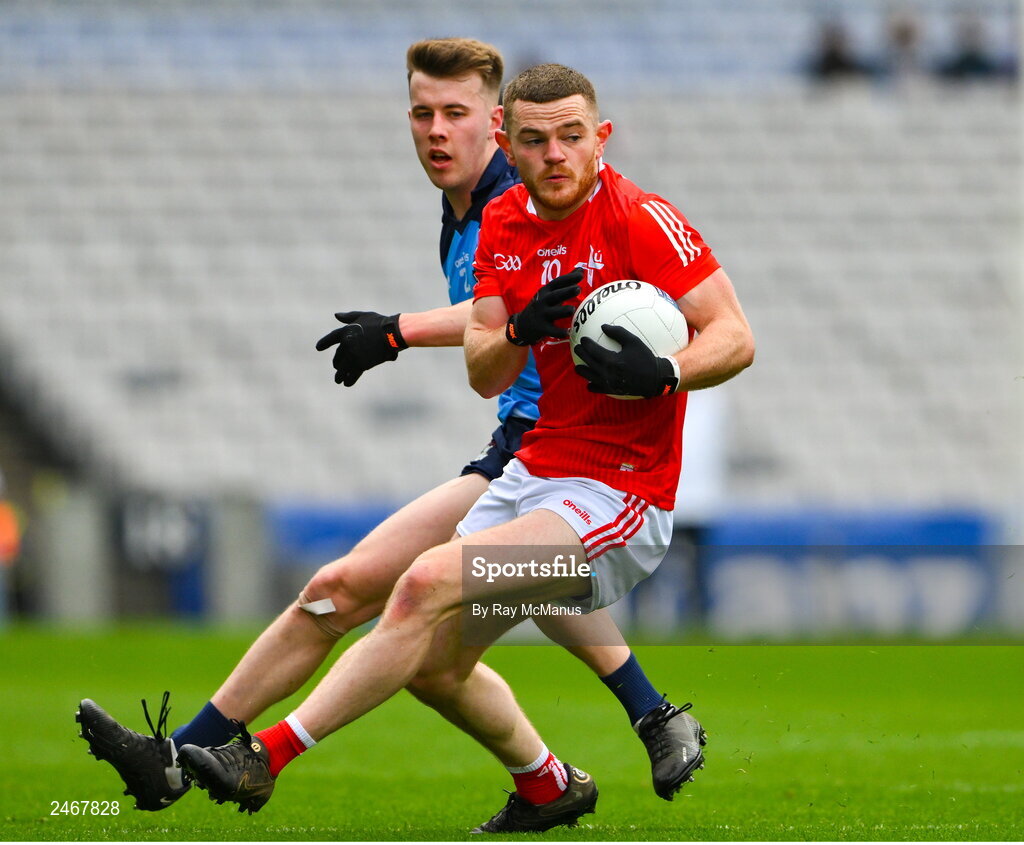 26 March 2023; Niall Sharkey of Louth in action against Dáire Newcombe of Dublin during the Allianz Football League Division 2 match between Dublin and Louth at Croke Park in Dublin. Photo by Ray McManus/Sportsfile