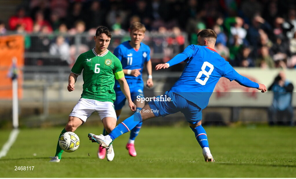 26 March 2023; Joe Hodge of Republic of Ireland in action against Andri Fannar Baldursson of Iceland during the Under-21 international friendly match between Republic of Ireland and Iceland at Turners Cross in Cork. Photo by Seb Daly/Sportsfile