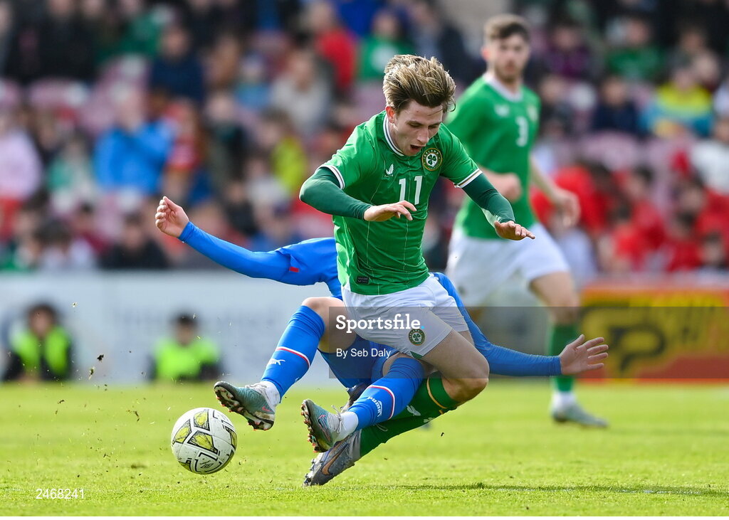 26 March 2023; Ollie O’Neill of Republic of Ireland is tackled by Andri Hoti of Iceland during the Under-21 international friendly match between Republic of Ireland and Iceland at Turners Cross in Cork. Photo by Seb Daly/Sportsfile