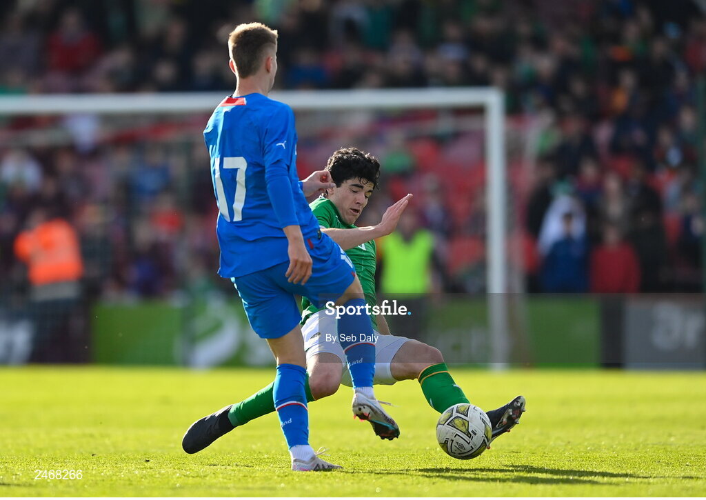 26 March 2023; Anselmo Garcia MacNulty of Republic of Ireland tackles Lukas Logi Heimisson of Iceland during the Under-21 international friendly match between Republic of Ireland and Iceland at Turners Cross in Cork. Photo by Seb Daly/Sportsfile