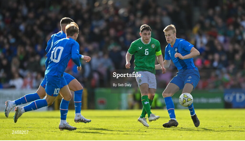 26 March 2023; Joe Hodge of Republic of Ireland in action against Ulfur Agust Bjornsson of Iceland, right, during the Under-21 international friendly match between Republic of Ireland and Iceland at Turners Cross in Cork. Photo by Seb Daly/Sportsfile