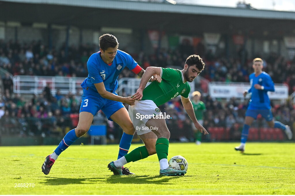 26 March 2023; Tom Cannon of Republic of Ireland in action against Oliver Stefansson of Iceland during the Under-21 international friendly match between Republic of Ireland and Iceland at Turners Cross in Cork. Photo by Seb Daly/Sportsfile