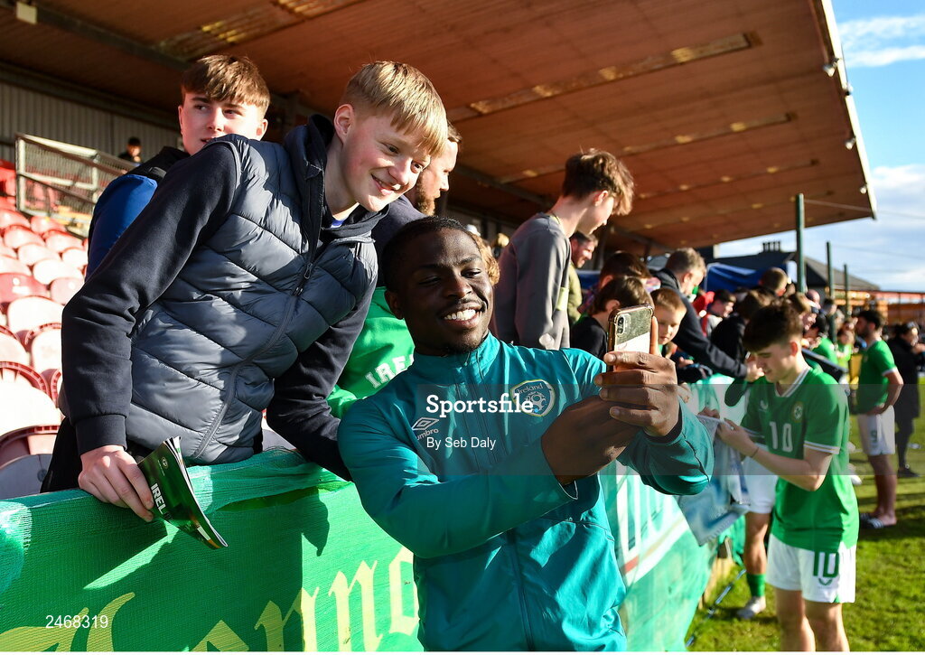 26 March 2023; Festy Ebosele of Republic of Ireland with supporters after the Under-21 international friendly match between Republic of Ireland and Iceland at Turners Cross in Cork. Photo by Seb Daly/Sportsfile