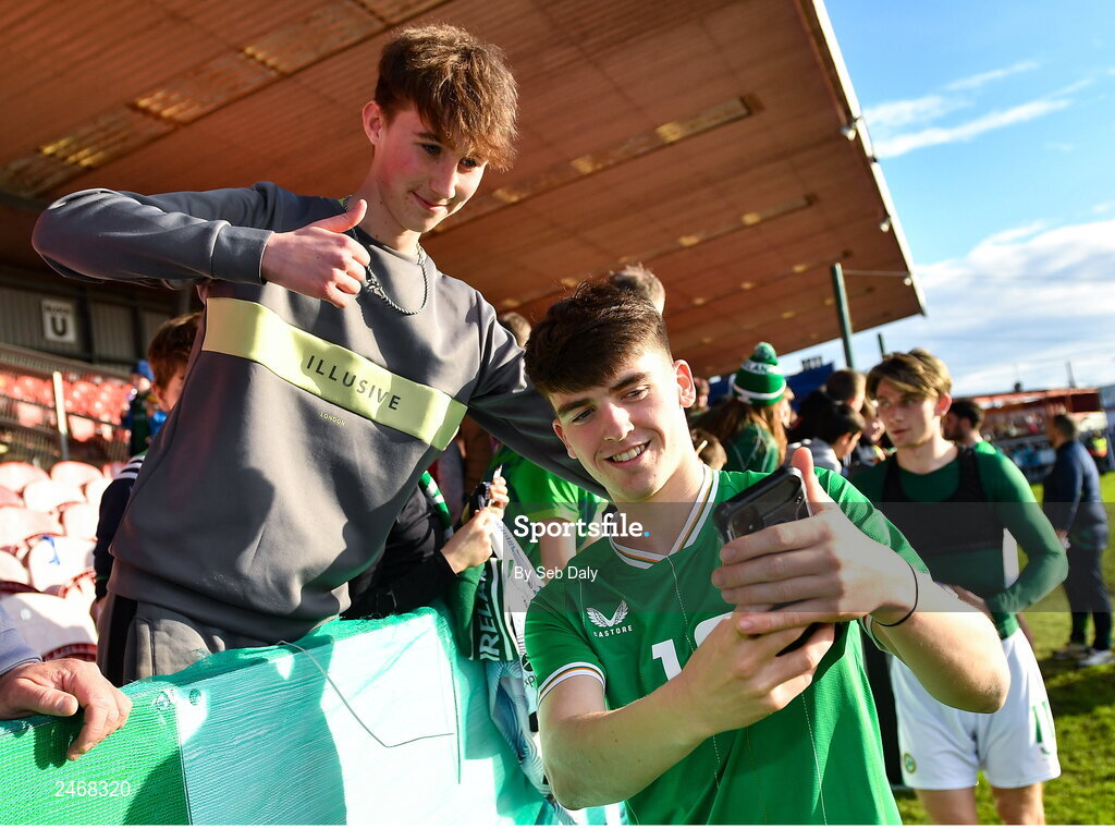 26 March 2023; Andrew Moran of Republic of Ireland with supporters after the Under-21 international friendly match between Republic of Ireland and Iceland at Turners Cross in Cork. Photo by Seb Daly/Sportsfile