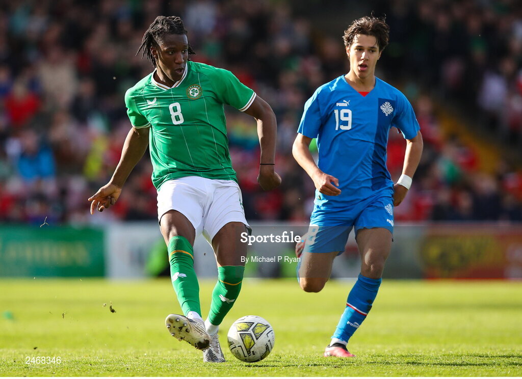 26 March 2023; Bosun Lawal of Republic of Ireland in action against Danijel Dejan Djuric of Iceland during the Under-21 international friendly match between Republic of Ireland and Iceland at Turner's Cross in Cork. Photo by Michael P Ryan/Sportsfile