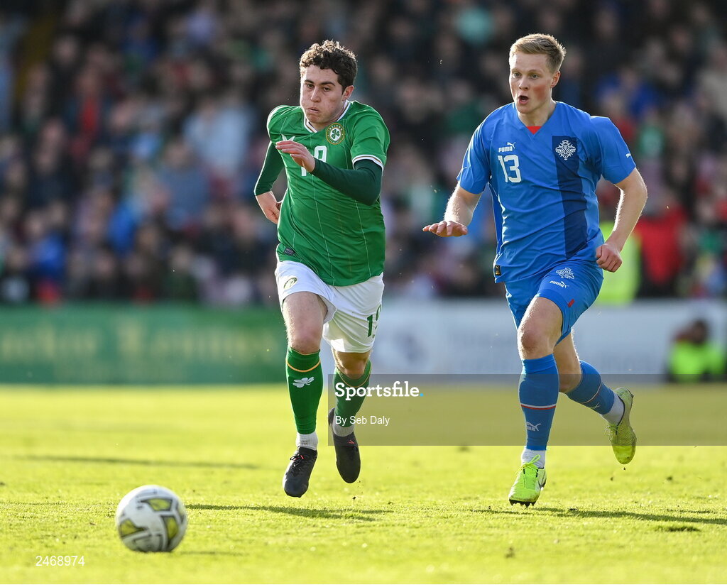 26 March 2023; Kian Leavy of Republic of Ireland in action against Arnor Gauti Jonsson of Iceland during the Under-21 international friendly match between Republic of Ireland and Iceland at Turners Cross in Cork. Photo by Seb Daly/Sportsfile