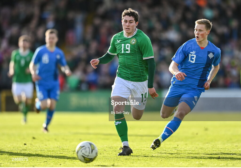 26 March 2023; Kian Leavy of Republic of Ireland in action against Arnor Gauti Jonsson of Iceland during the Under-21 international friendly match between Republic of Ireland and Iceland at Turners Cross in Cork. Photo by Seb Daly/Sportsfile