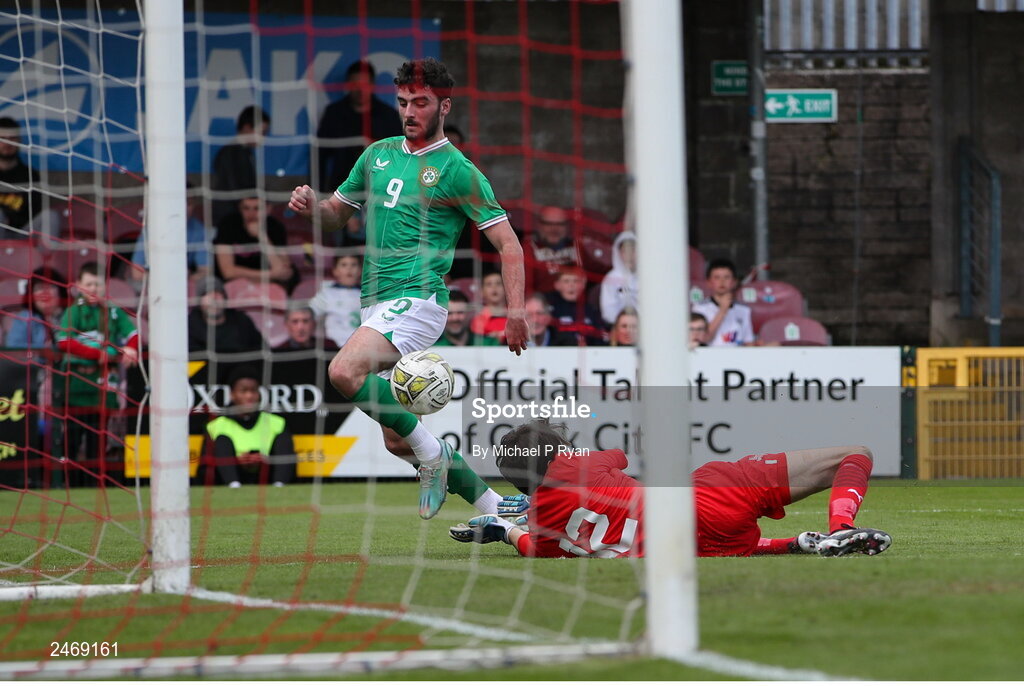 26 March 2023; Tom Cannon of Republic of Ireland in action against Iceland goalkeeper Adam Ingi Benediktsson during the Under-21 international friendly match between Republic of Ireland and Iceland at Turner's Cross in Cork. Photo by Michael P Ryan/Sportsfile