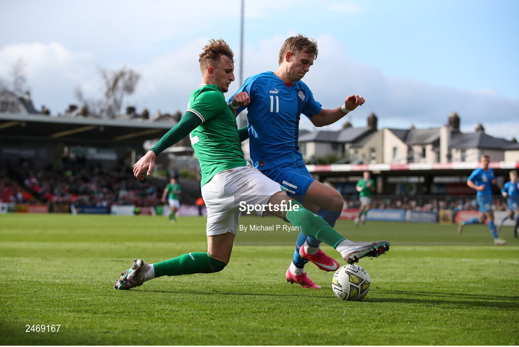 26 March 2023; Sam Curtis of Republic of Ireland in action against Isak Andri Sigurgeirsson of Iceland during the Under-21 international friendly match between Republic of Ireland and Iceland at Turner's Cross in Cork. Photo by Michael P Ryan/Sportsfile