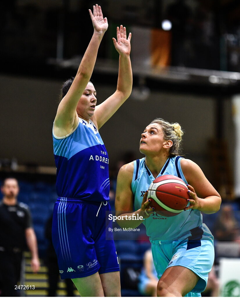 1 April 2023; Hannah Thornton of DCU Mercy in action against Amy Dooley of The Address UCC Glanmire during the MissQuote.ie Champions Trophy Final match between The Address UCC Glanmire, Cork and DCU Mercy, Dublin at National Basketball Arena in Tallaght, Dublin. Photo by Ben McShane/Sportsfile
