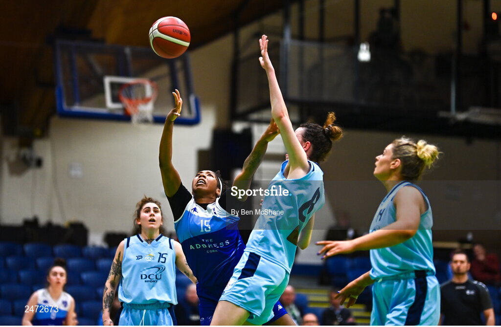 1 April 2023; Khiarica Rasheed of The Address UCC Glanmire scores a basket depite Rachel Huijsdens of DCU Mercy during the MissQuote.ie Champions Trophy Final match between The Address UCC Glanmire, Cork and DCU Mercy, Dublin at National Basketball Arena in Tallaght, Dublin. Photo by Ben McShane/Sportsfile