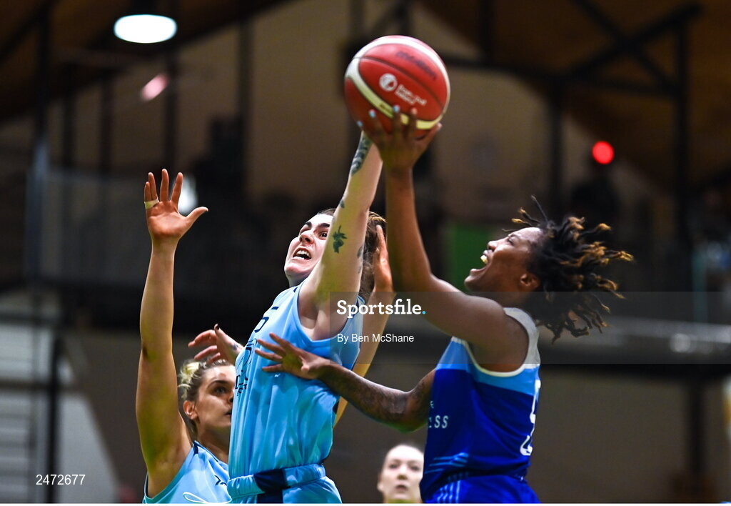 1 April 2023; Lindsey Abed of DCU Mercy blocks the shot of Brittany Byrd of The Address UCC Glanmire during the MissQuote.ie Champions Trophy Final match between The Address UCC Glanmire, Cork and DCU Mercy, Dublin at National Basketball Arena in Tallaght, Dublin. Photo by Ben McShane/Sportsfile