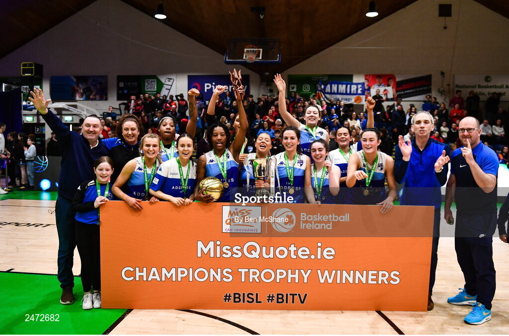 1 April 2023; The Address UCC Glanmire players celebrate with the cup after MissQuote.ie Champions Trophy Final match between The Address UCC Glanmire, Cork and DCU Mercy, Dublin at National Basketball Arena in Tallaght, Dublin. Photo by Ben McShane/Sportsfile