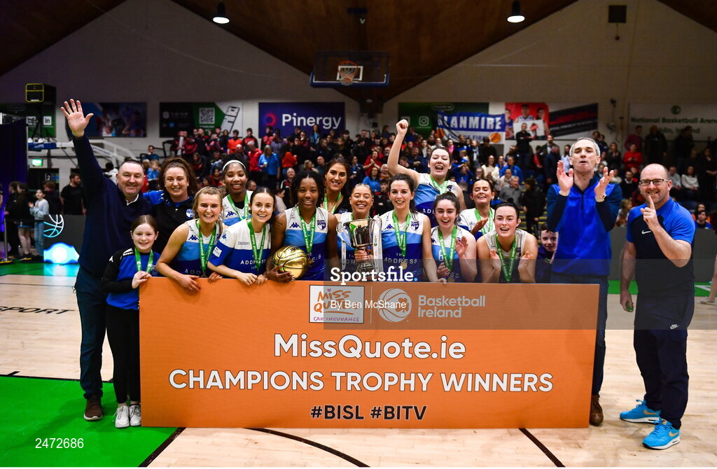 1 April 2023; The Address UCC Glanmire players celebrate with the cup after MissQuote.ie Champions Trophy Final match between The Address UCC Glanmire, Cork and DCU Mercy, Dublin at National Basketball Arena in Tallaght, Dublin. Photo by Ben McShane/Sportsfile