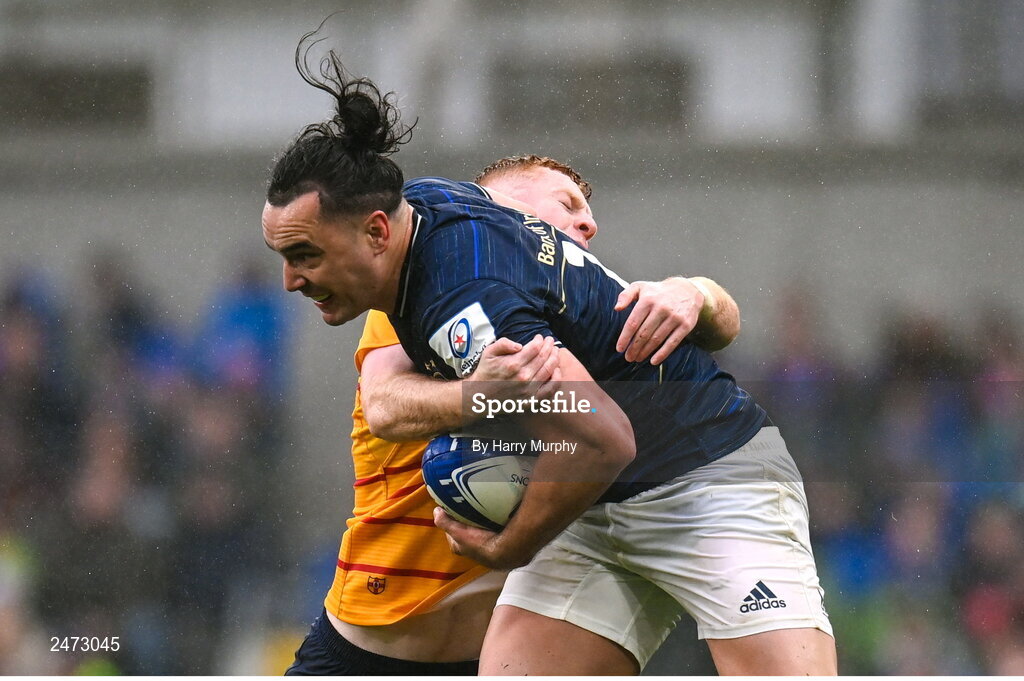 1 April 2023; James Lowe of Leinster is tackled by Nathan Doak of Ulster during the Heineken Champions Cup Round of 16 match between Leinster and Ulster at the Aviva Stadium in Dublin. Photo by Harry Murphy/Sportsfile