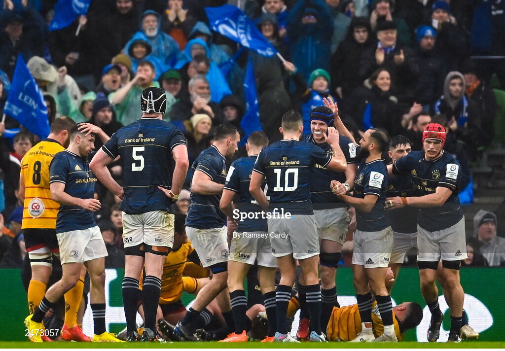 1 April 2023; Ryan Baird of Leinster, third, from right, celebrates with teammates after scoring his side's first try during the Heineken Champions Cup Round of 16 match between Leinster and Ulster at Aviva Stadium in Dublin. Photo by Ramsey Cardy/Sportsfile