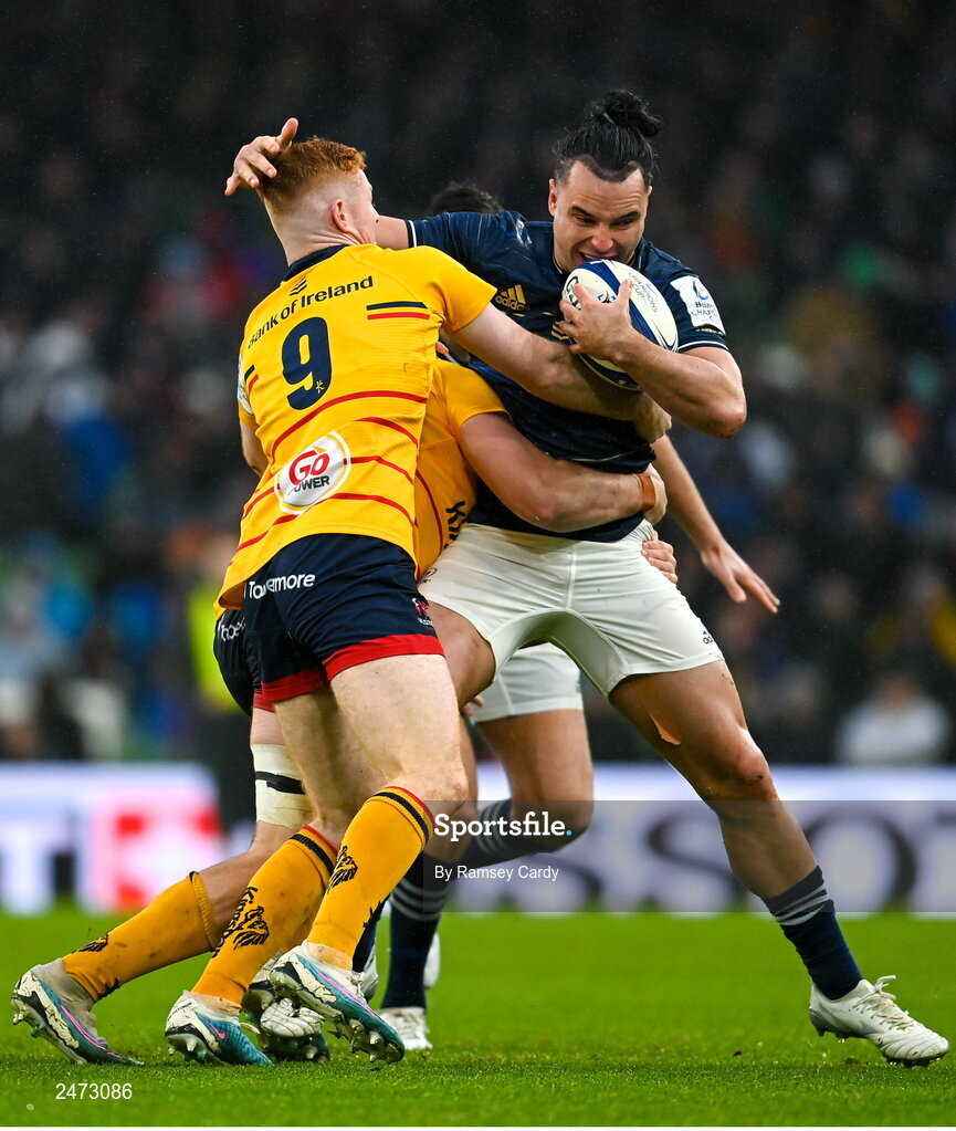 1 April 2023; James Lowe of Leinster is tackled by Nathan Doak of Ulster during the Heineken Champions Cup Round of 16 match between Leinster and Ulster at Aviva Stadium in Dublin. Photo by Ramsey Cardy/Sportsfile